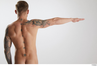 Gilbert 1 arm back view flexing nude 0003.jpg